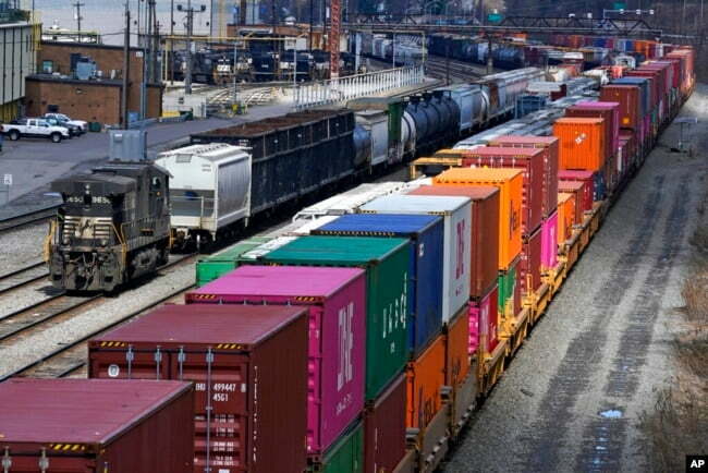 Freight train cars and containers are seen at Norfolk Southern Railroad's Conway Yard in Conway, Pa., April 2, 2021.