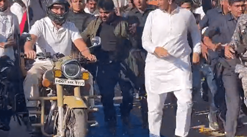 Congress leader Rahul Gandhi rides bike during Bharat Jodo Yatra in Madhya Pradesh